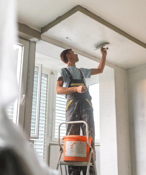 Plastering a ceiling